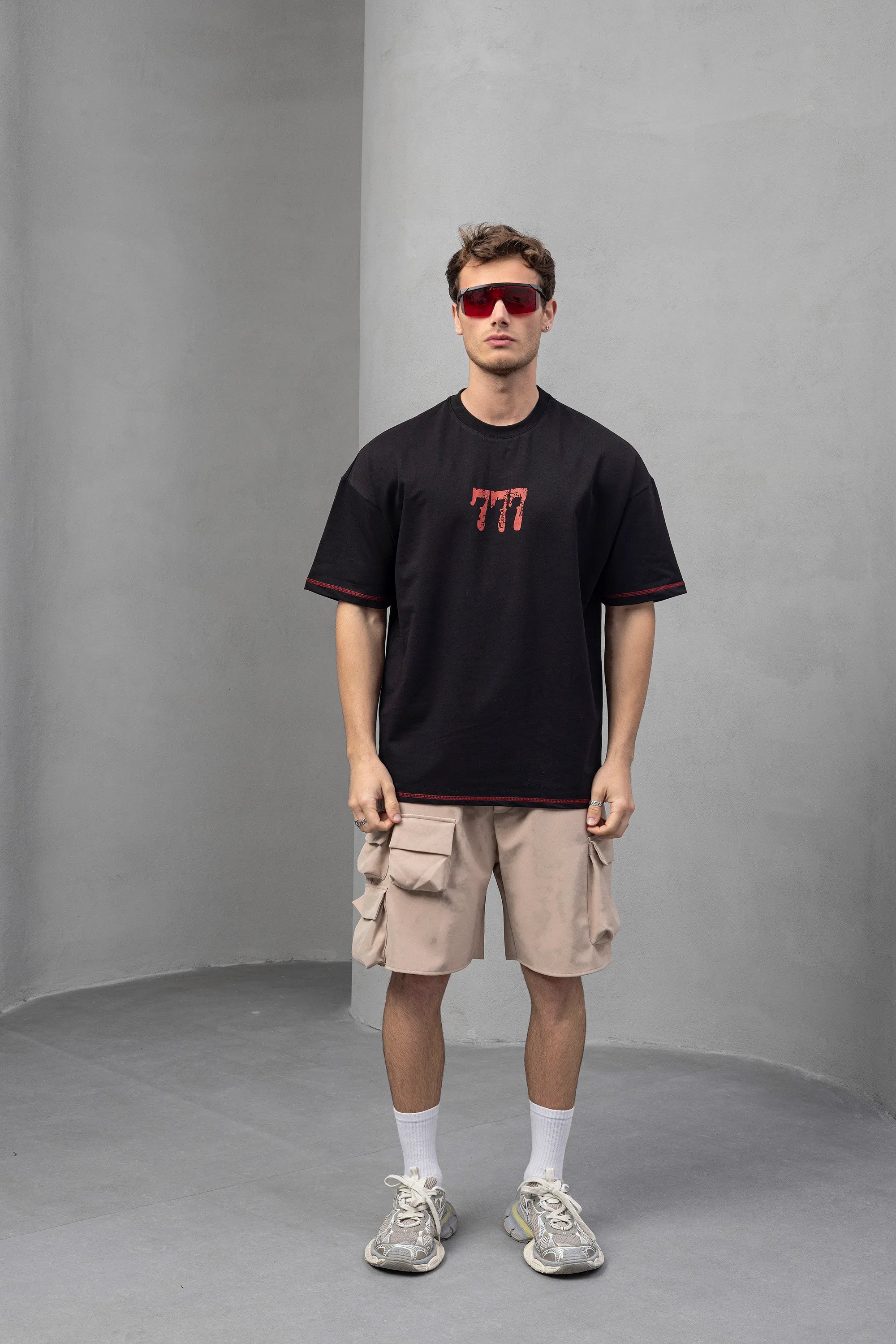 Black Graphic Tee with Bold '77' and Mercy Print