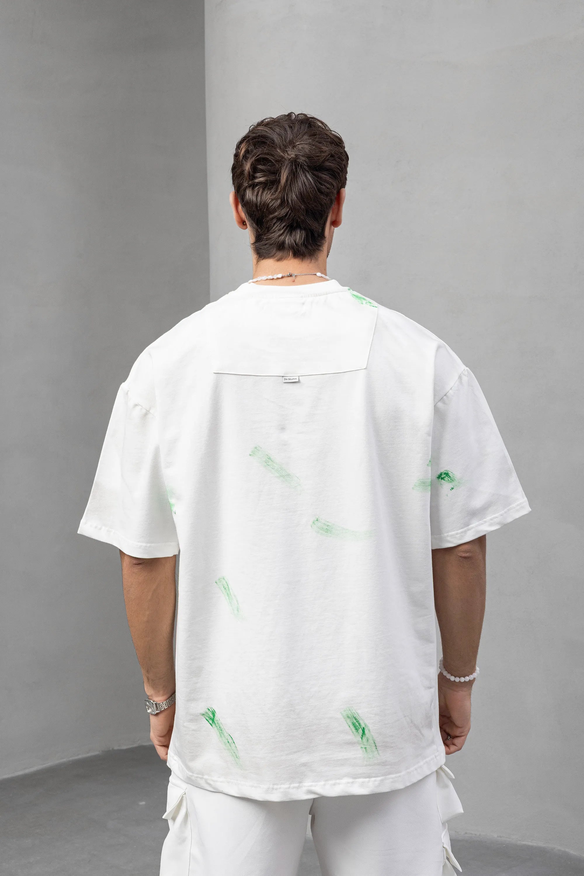 White Graphic Tee with Green Brushstroke Print