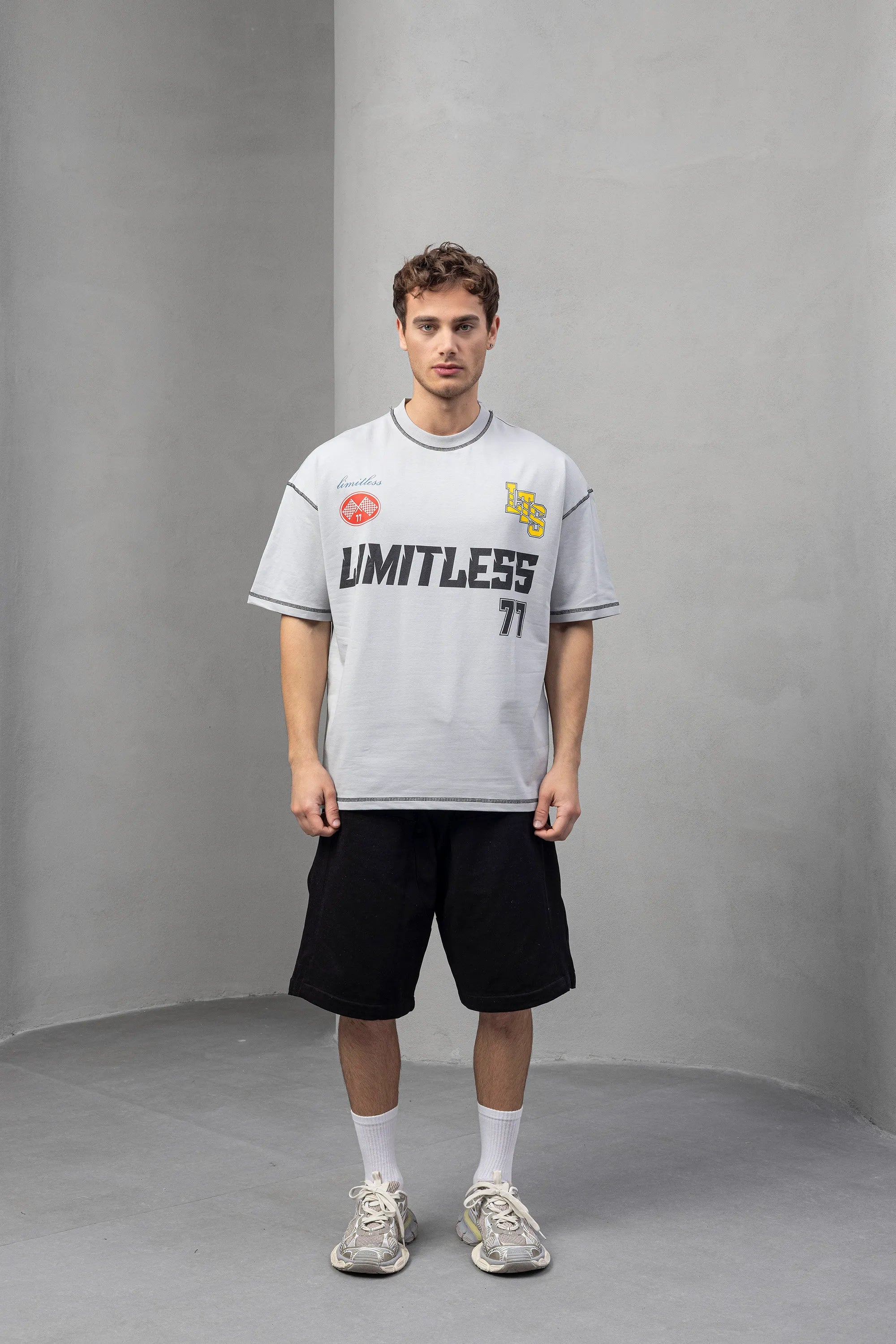 Gray Graphic Tee with 'Limitless' and 77 Design