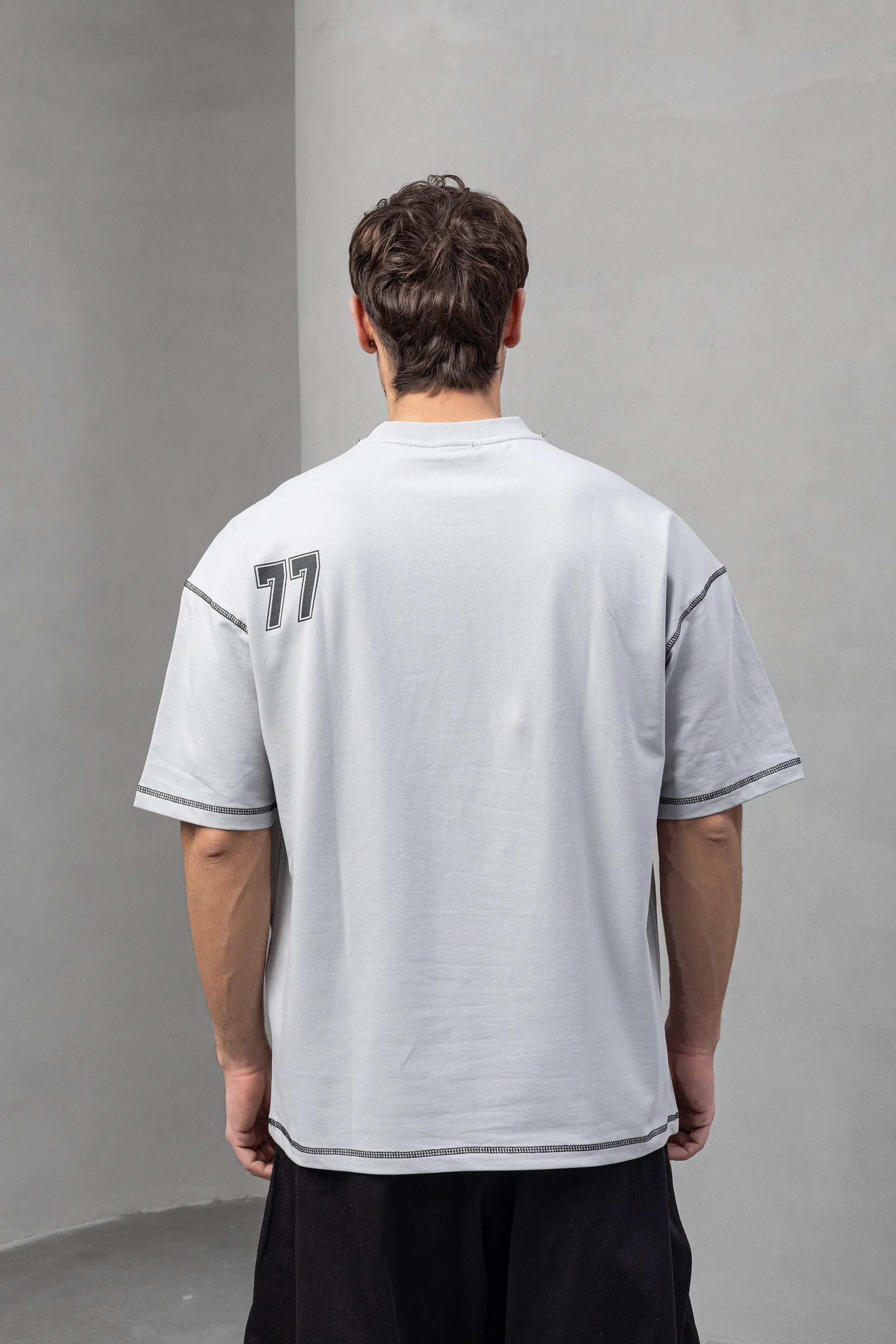 Gray Graphic Tee with 'Limitless' and 77 Design