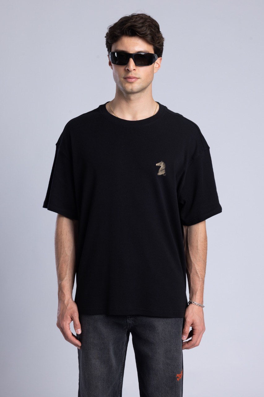 Black Graphic T-Shirt with Dark Denim Jeans