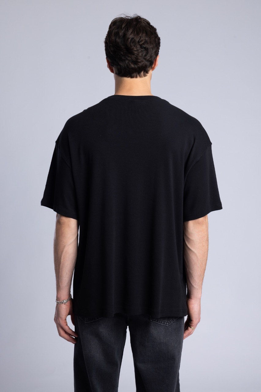 Black Graphic T-Shirt with Dark Denim Jeans