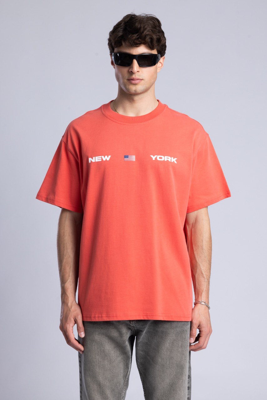 New York Graphic Tee in Coral with Flag Design