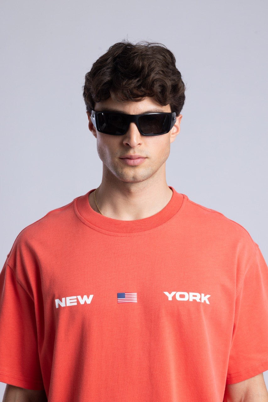 New York Graphic Tee in Coral with Flag Design