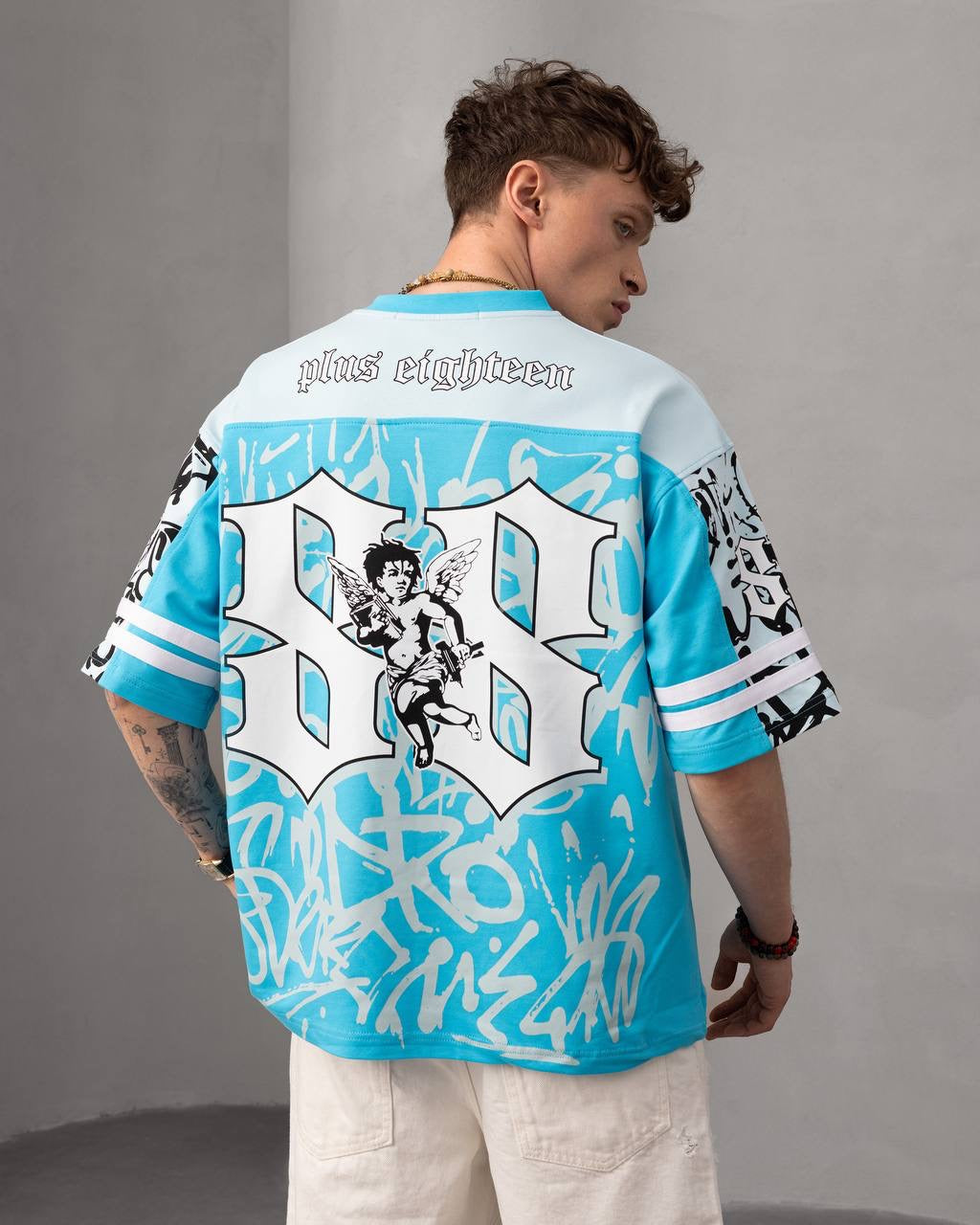 Graffiti Print Oversized Football Jersey – Casual Streetwear with Bold Design