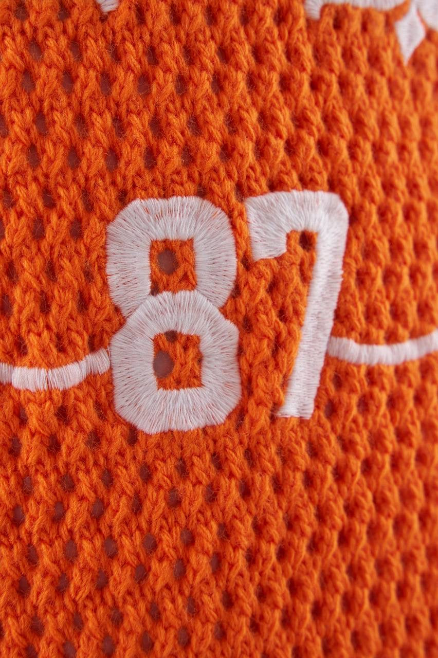 Men’s Orange Knit Tee with Badge