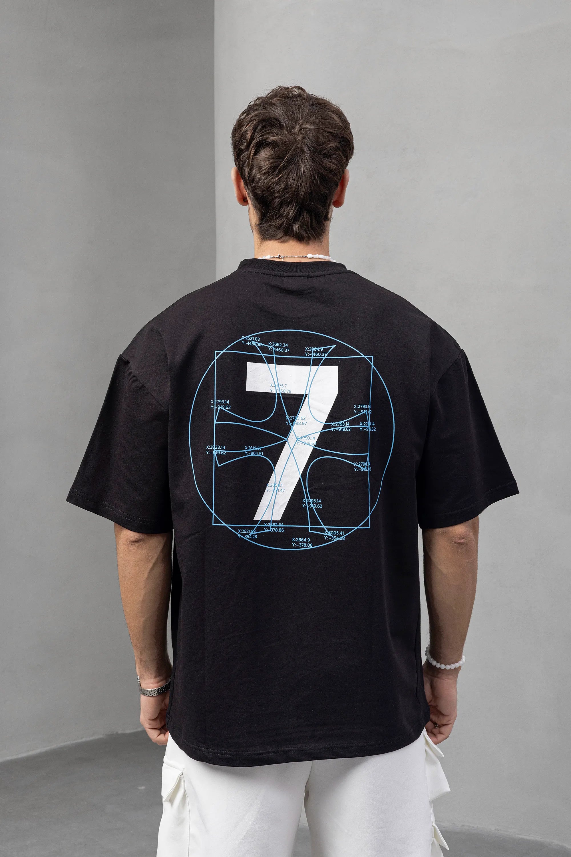 7 Graphic Black T-Shirt with Abstract Print Design