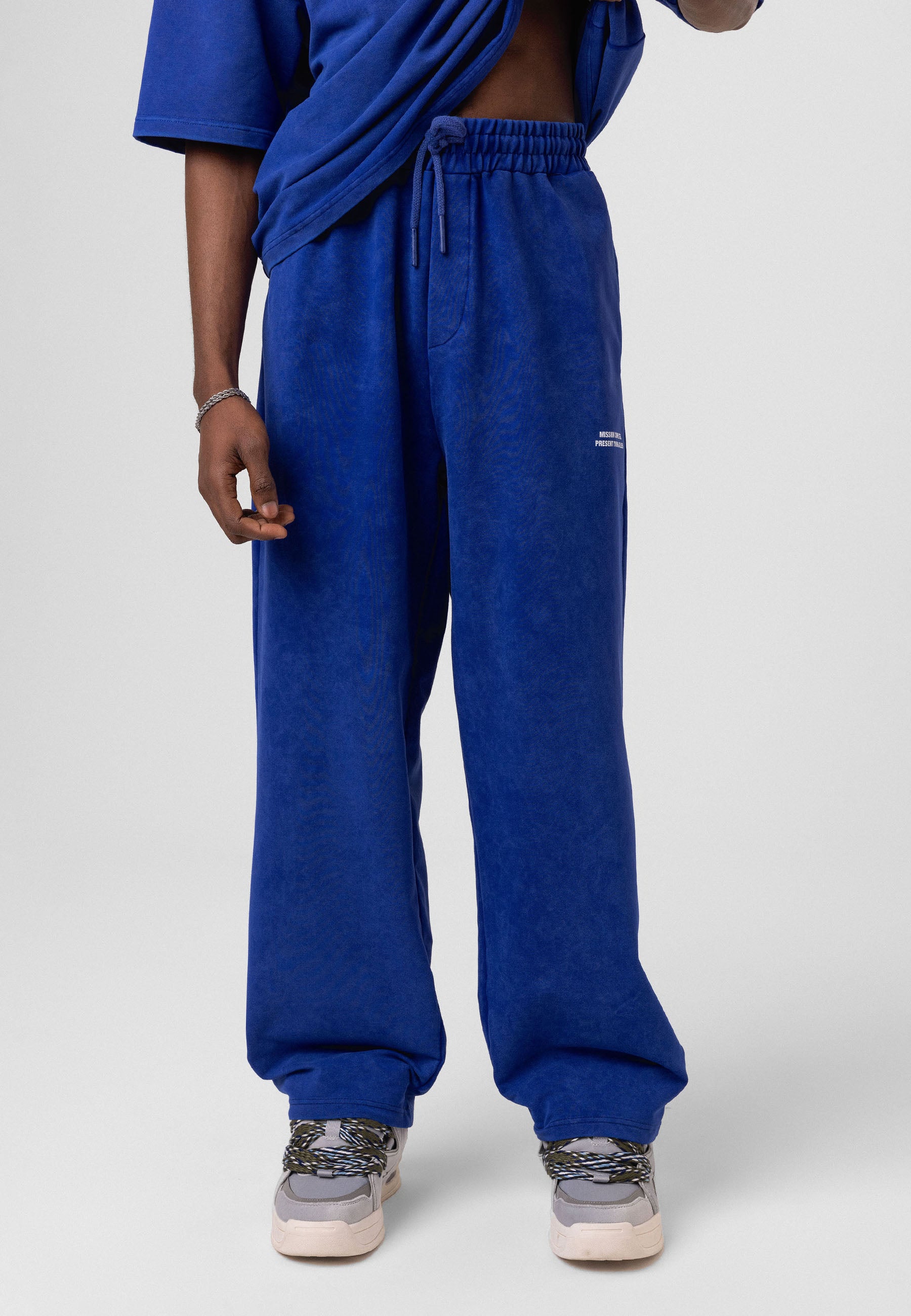 Oversized Washed Track Pants – Street-Ready Comfort with Soft Texture