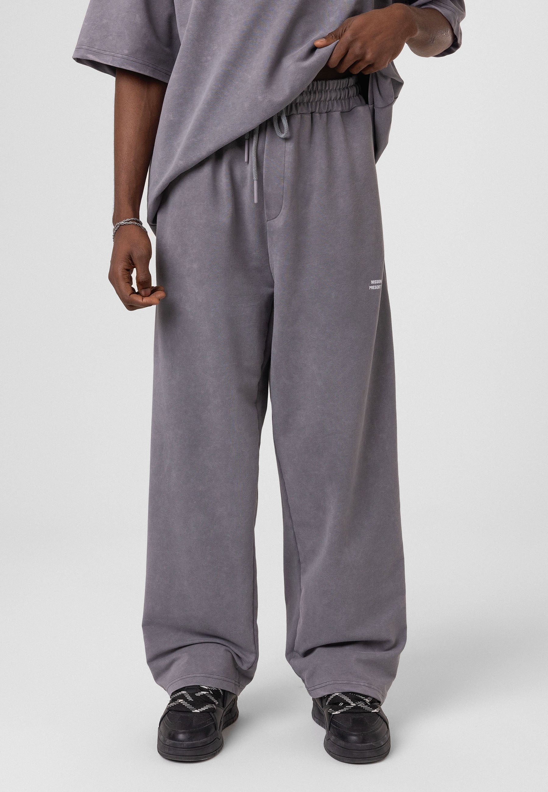 Oversized Washed Track Pants – Street-Ready Comfort with Soft Texture