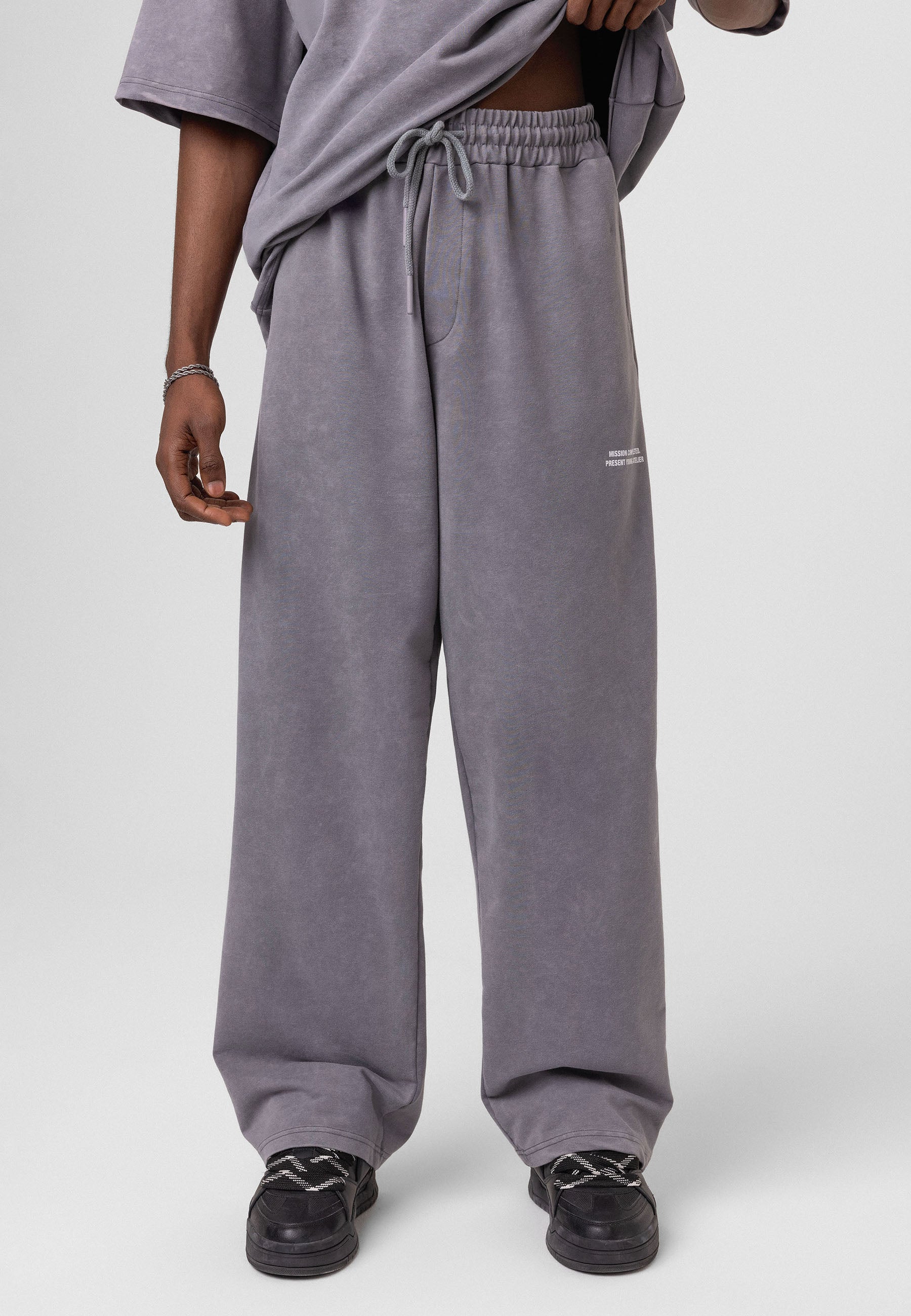 Oversized Washed Track Pants – Street-Ready Comfort with Soft Texture