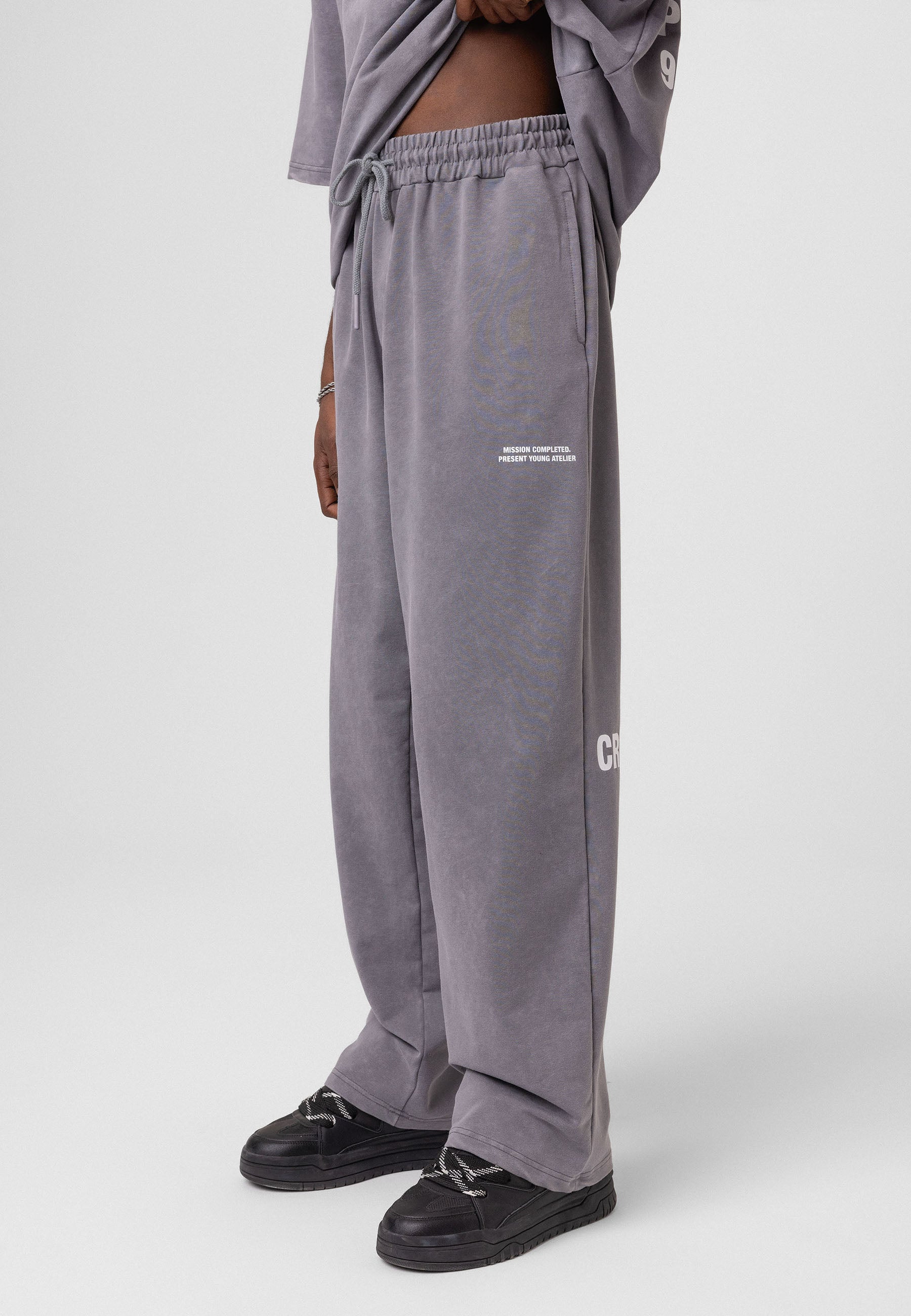 Oversized Washed Track Pants – Street-Ready Comfort with Soft Texture