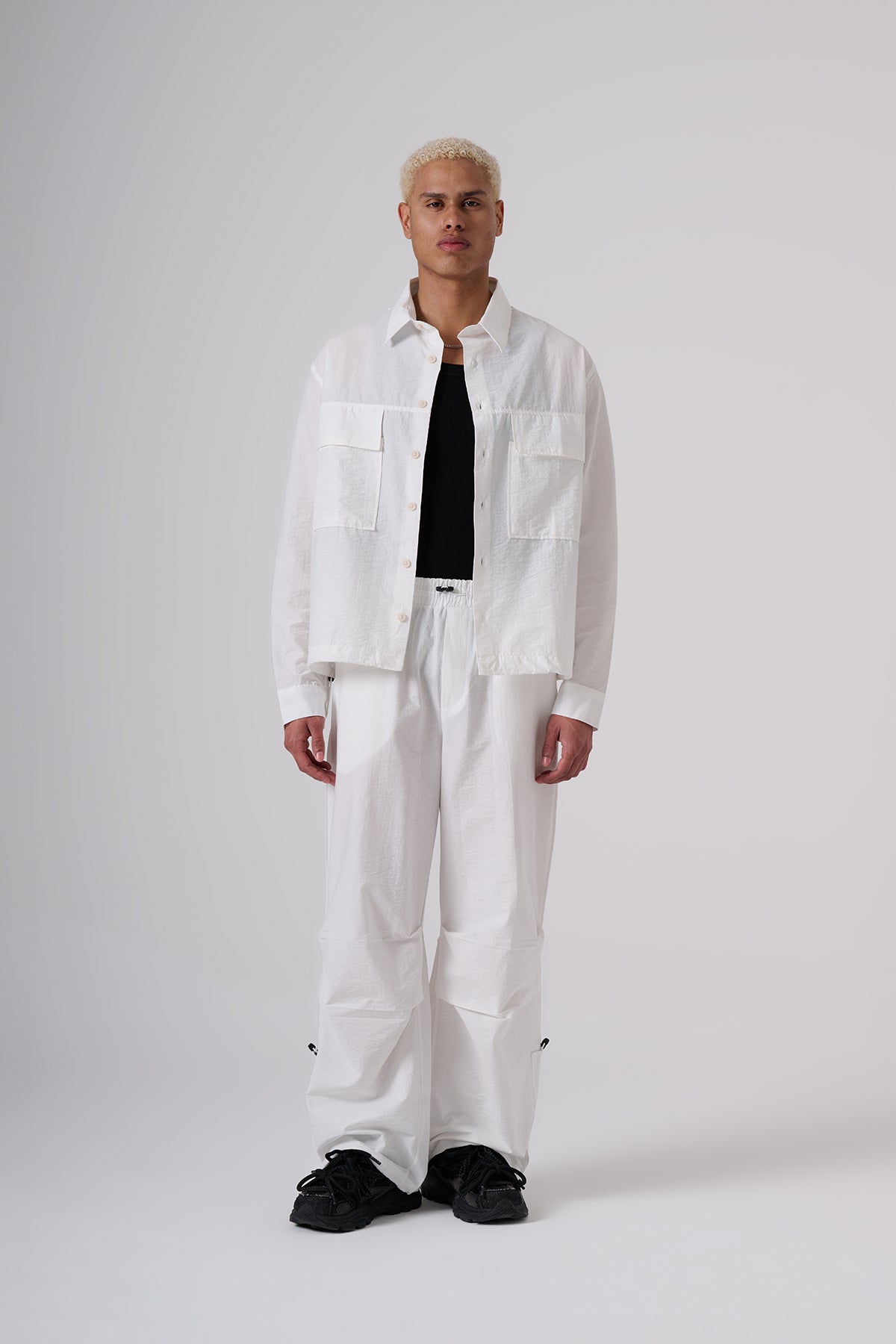 White Oversized Coat & Jackets – Minimal Black Embroidered Chest Detail