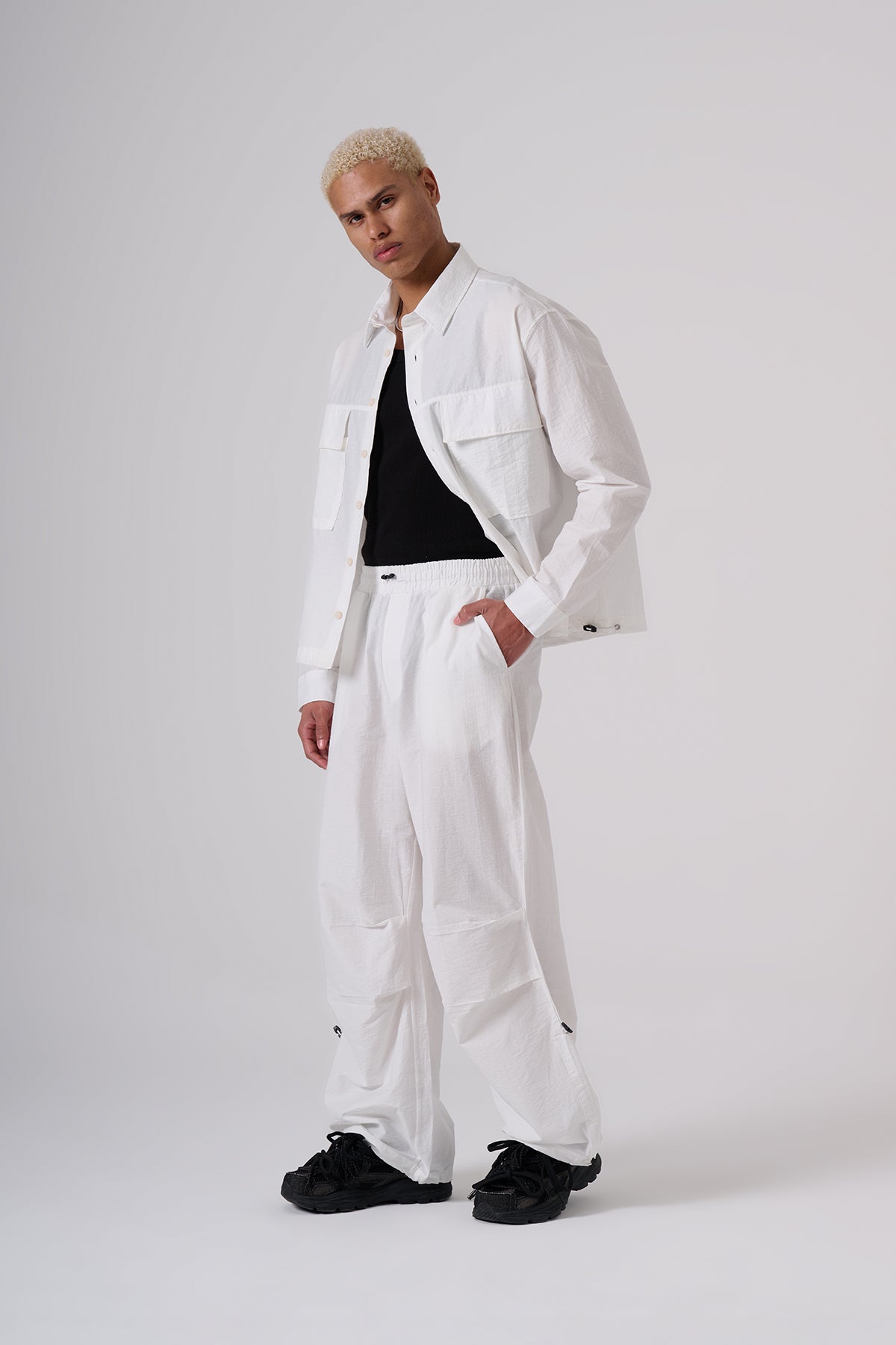 White Oversized Coat & Jackets – Minimal Black Embroidered Chest Detail