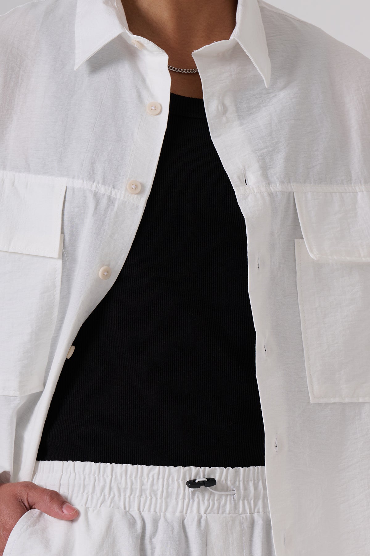 White Oversized Coat & Jackets – Minimal Black Embroidered Chest Detail