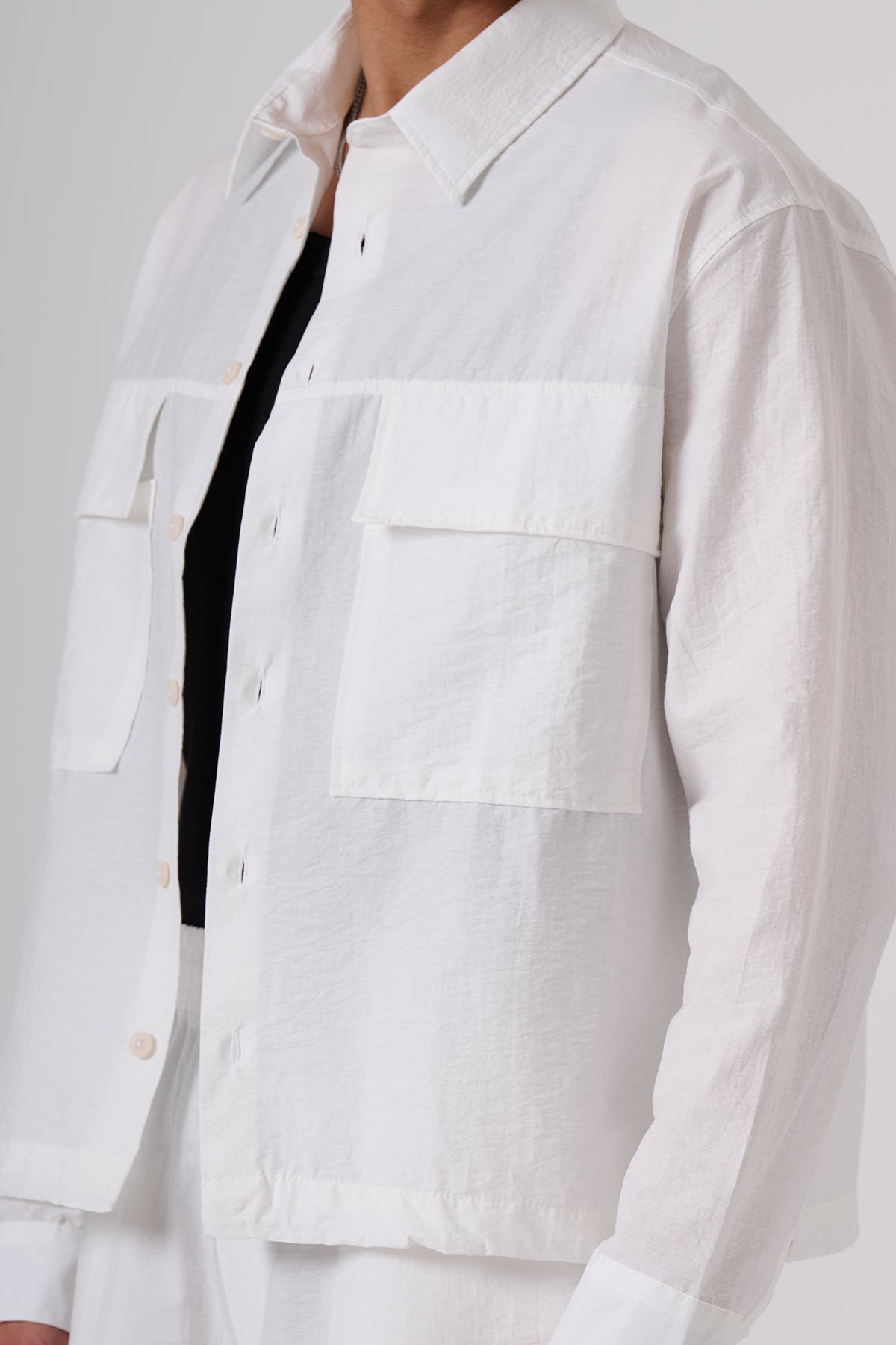 White Oversized Coat & Jackets – Minimal Black Embroidered Chest Detail