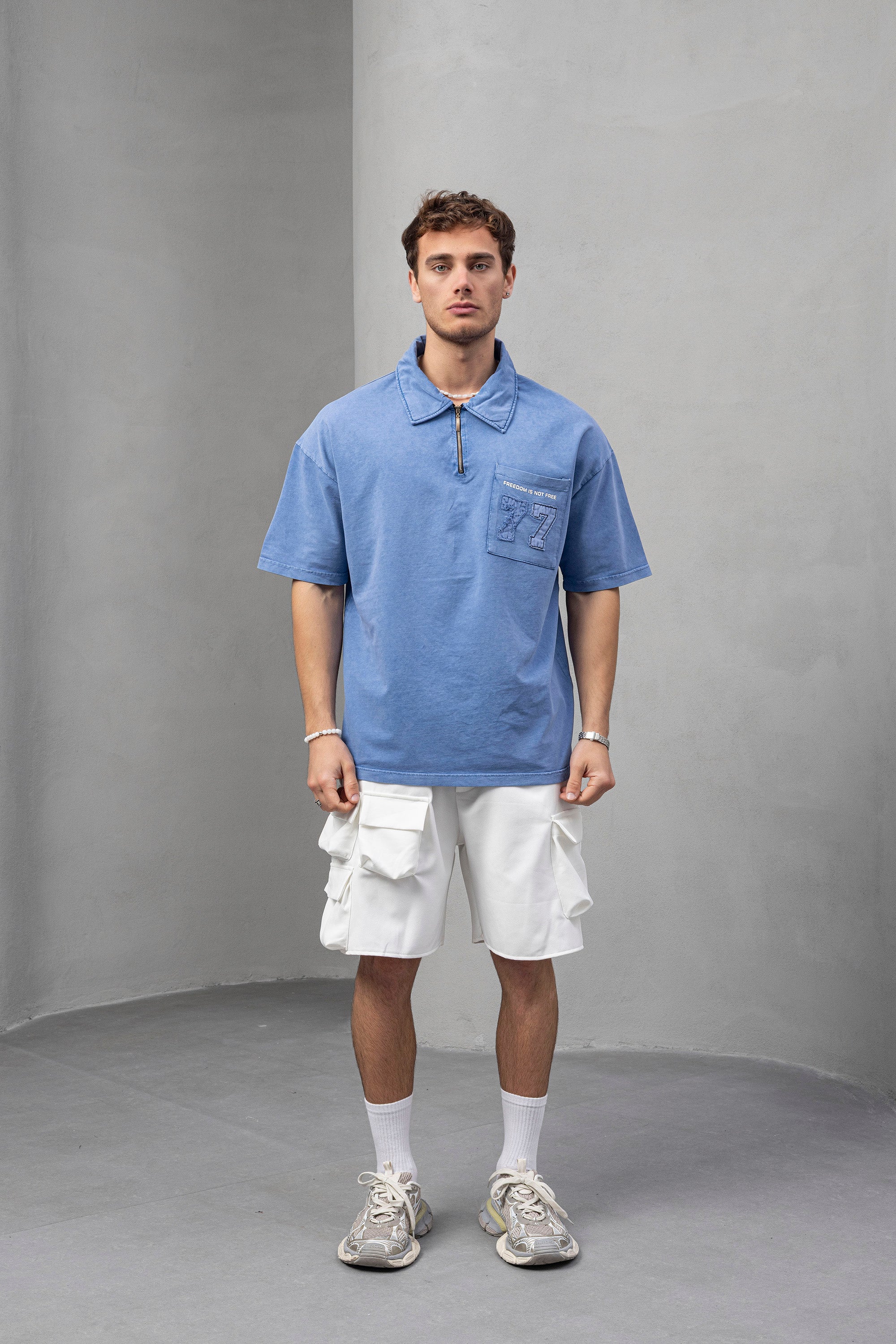 Oversized Embroidered Pocket Polo – Subtle Detailing, Clean Structure
