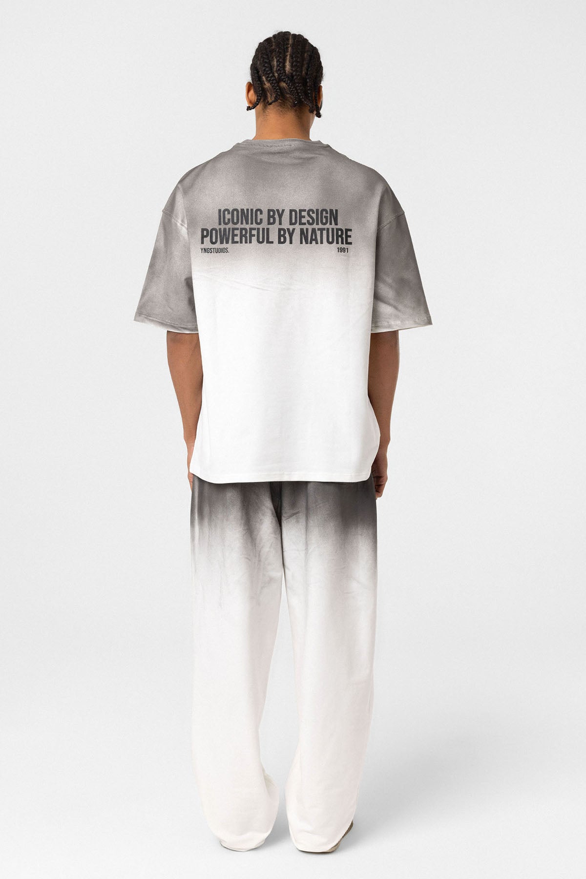 Oversized Graphic Tee – Washed Texture Meets Bold Back Print