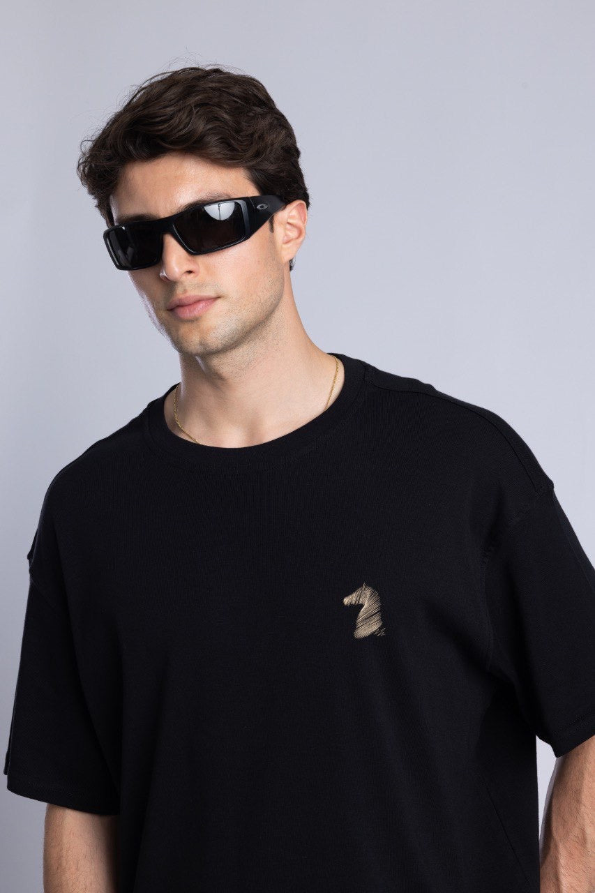 Black Graphic T-Shirt with Dark Denim Jeans