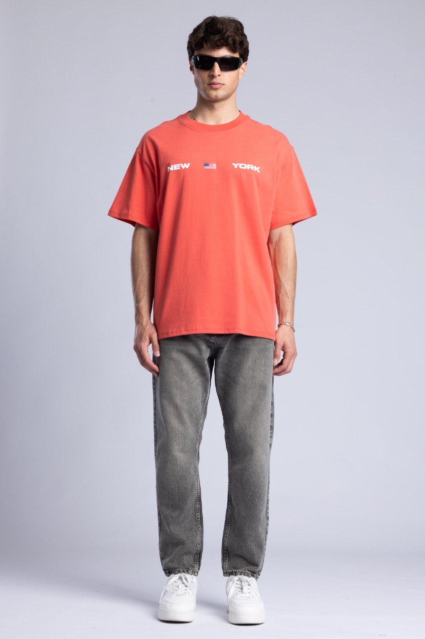New York Graphic Tee in Coral with Flag Design