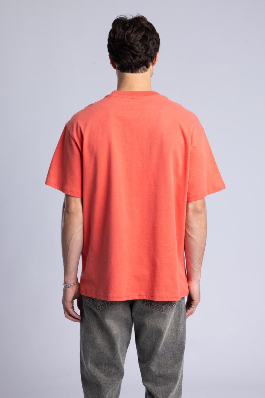 New York Graphic Tee in Coral with Flag Design